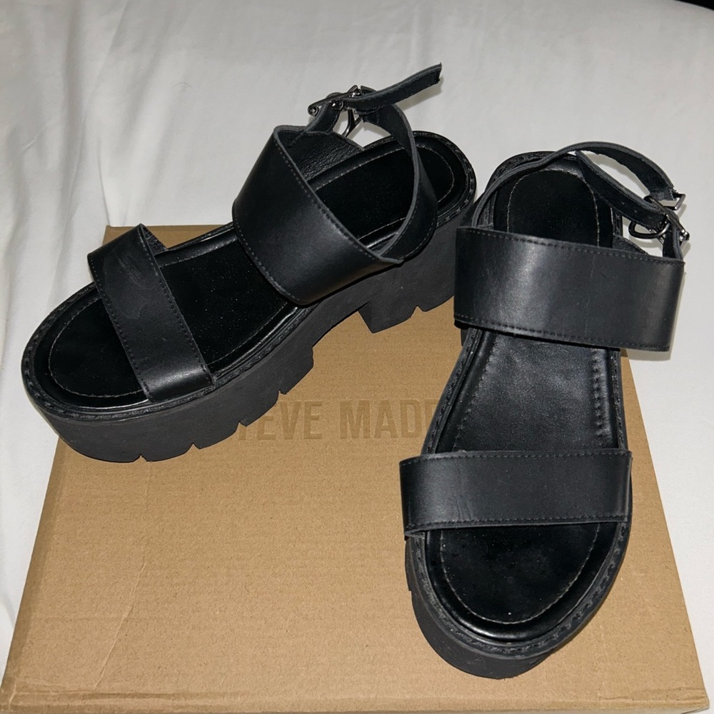 Woman’s black platform sandals